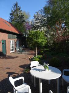 Zahrada ubytování Ferienhaus 258 S in Eckwarden + 3 fotografie