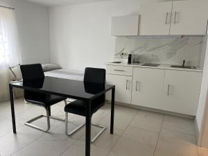 Dapur atau dapur kecil di Stadtapartment