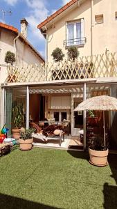 Κήπος έξω από το PARIS AUTHENTIC HOUSE 2 Maisons 1 studio ideale pour groupes, capacité 30 personnes