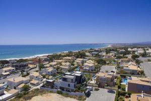 an aerial view of a city and the ocean at Villa Maresia in Patroves