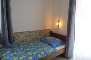 Posteľ alebo postele v izbe v ubytovaní 3 fös apartman