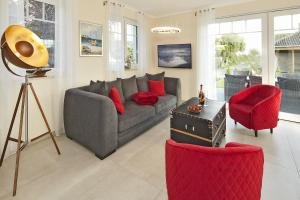 Posezení v ubytování Ferienhaus Meerambiente + 13 fotografií