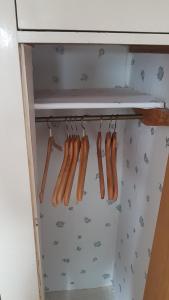 a row of hot dogs hanging in a refrigerator at Ferienwohnung Conny in Butjadingen