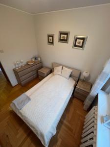 Ένα ή περισσότερα κρεβάτια σε δωμάτιο στο Apartament Elizabeth