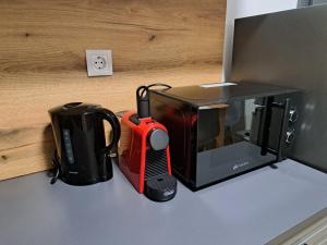 Kemudahan buat kopi dan teh di Studio with free Parking in the Center - Deliamo 3