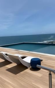 een conceptuele weergave van een boot op een strand bij Apartamento no 9º Andar com Vista Privilegiada para o Mar in Salvador
