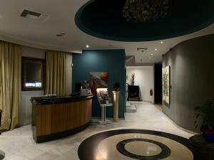 TV a/nebo společenská místnost v ubytování Art Hotel Athens