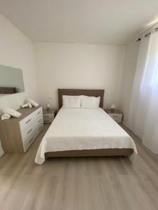 Ένα ή περισσότερα κρεβάτια σε δωμάτιο στο Relax home