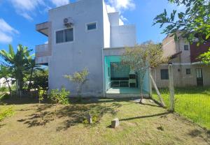 Vườn quanh Casa Entre Verde e Mar Praia do Mariscal