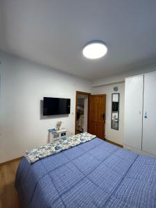 Ένα ή περισσότερα κρεβάτια σε δωμάτιο στο Rivi's House