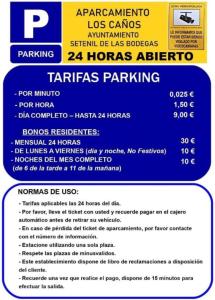Un folleto para un estacionamiento con un montón de números en Casa Rural Abril, en Setenil 23 fotos más