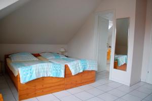 Ένα ή περισσότερα κρεβάτια σε δωμάτιο στο Privatzimmer Ehrhardt Nr1