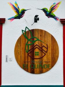Hostal El Quinde的证书、奖牌、标识或其他文件