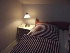 Postel nebo postele na pokoji v ubytování "Ferienhaus Vadersdorf" Wohnung 1