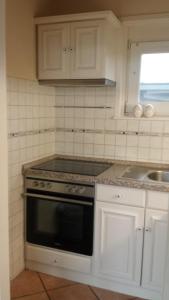 Køkken eller tekøkken på Strandgut - Bungalow am Meer