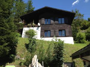 a house on top of a hill at Töniberg Lounge in Elm