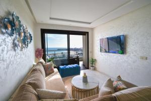 TV a/nebo společenská místnost v ubytování Appartement Belle Vue Agadir