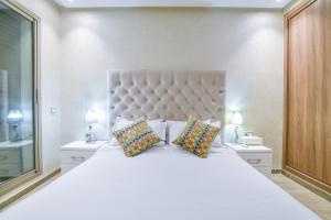 Postel nebo postele na pokoji v ubytování Appartement Belle Vue Agadir