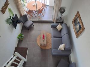 Et opholdsområde på Duplex entre mer et golf + 5 billeder