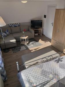 Et tv og/eller underholdning på Ferienwohnung Familie Ruff