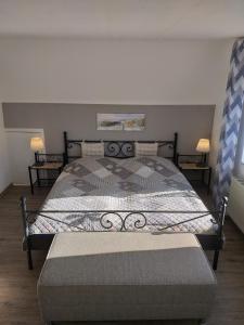 En eller flere senge i et værelse på Ferienwohnung Familie Ruff