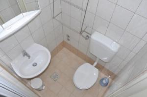 Koupelna v ubytování Apartment Petar + 37 fotografií