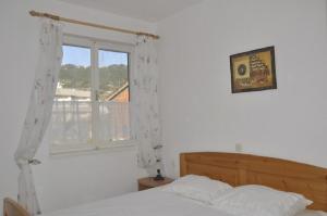 Postel nebo postele na pokoji v ubytování Apartment Petar