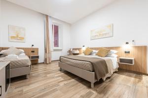 Postel nebo postele na pokoji v ubytování CHD Rooms