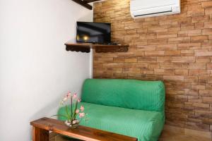TV a/nebo společenská místnost v ubytování Apartments Vida with garden:
