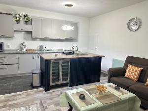 Kuchyň nebo kuchyňský kout v ubytování Mario apartament