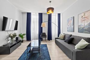 TV a/nebo společenská místnost v ubytování Fast Wifi I 4 min to U3 Zipperer Straße
