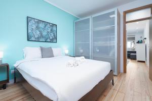 Postel nebo postele na pokoji v ubytování BeGuest Bright Inn Lisbon Apartment + 14 fotografií