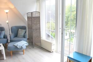 Posezení v ubytování Hamburger Str 8 I - Wohnung "Bentje" + 13 fotografií