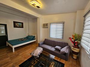 Postel nebo postele na pokoji v ubytování Airusxander Beach Resort