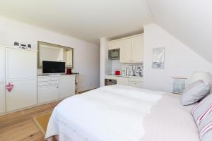 Kuchyň nebo kuchyňský kout v ubytování Strandperle-Föhr