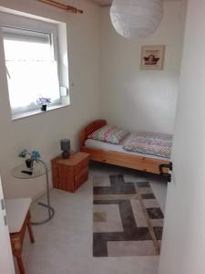 Ένα ή περισσότερα κρεβάτια σε δωμάτιο στο Schwedenhaus RE25