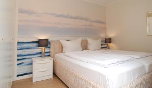 En eller flere senge i et værelse på STRANDIDYLL, 106 - Typ B6S + 17 billeder