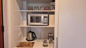 Kuchyň nebo kuchyňský kout v ubytování Rose House + 18 fotografií