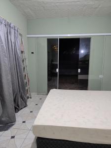 Postel nebo postele na pokoji v ubytování Casa do Jamail