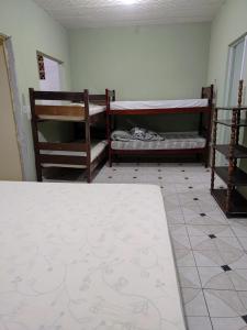 Postel nebo postele na pokoji v ubytování Casa do Jamail