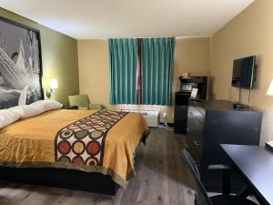 Postel nebo postele na pokoji v ubytování Super 8 by Wyndham Mendota I-39