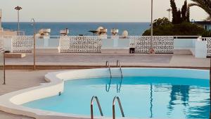 The swimming pool at or close to Comfortable flat close to the beach