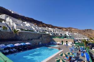 Bazén v ubytování Comfortable Apartment in Puerto Rico nebo v jeho okolí