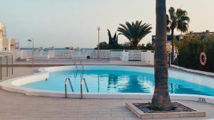 The swimming pool at or close to Comfortable flat close to the beach