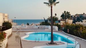 The swimming pool at or close to Comfortable flat close to the beach