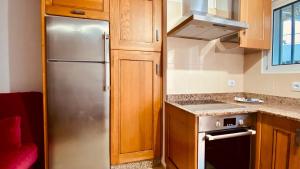 A kitchen or kitchenette at Comfortable flat close to the beach
