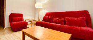 A seating area at Comfortable flat close to the beach