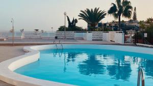 The swimming pool at or close to Comfortable flat close to the beach
