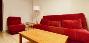 A seating area at Comfortable flat close to the beach