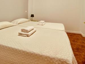 Postel nebo postele na pokoji v ubytování Casa Edison